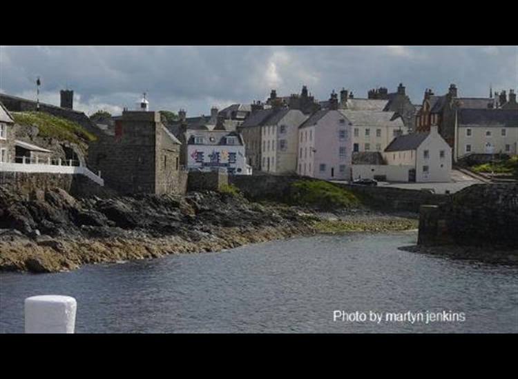 6 Portsoy at low water. looking SW from the new harbour with the old harbour entrance round the corner centre right