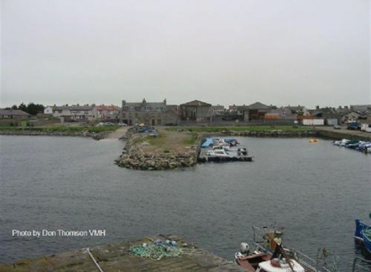 Sandhaven Pier dividing west basin from disused East Basin.jpg