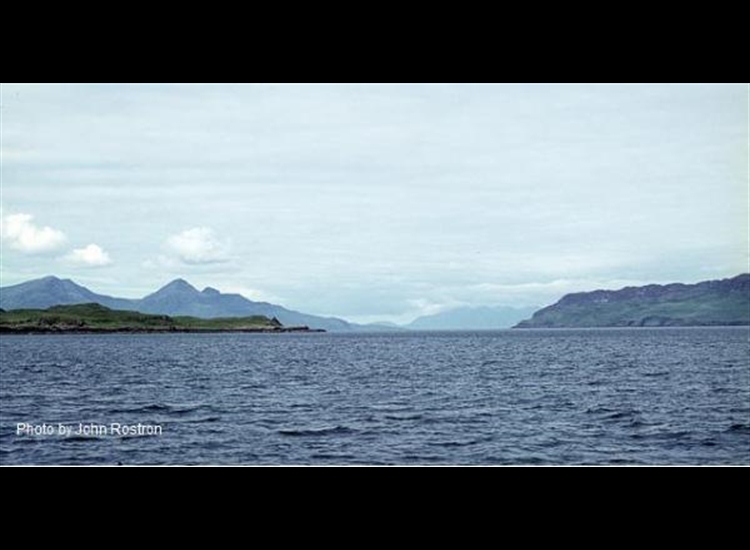 Muck (left), Eigg (right) Rum (behind Muck)  & Skye (far distance)